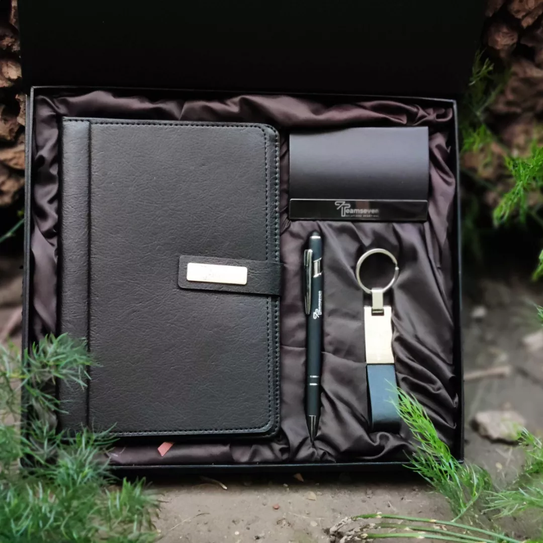Teamseven branded corporate gift set — leather notebook, pen and keychain